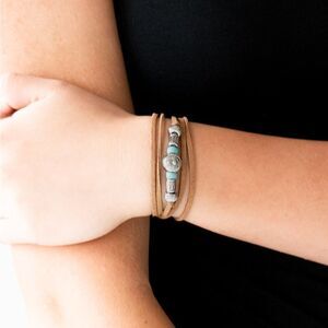Sueded band bracelet with blue and silver charms